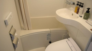 Single room with kitchen and washing machine