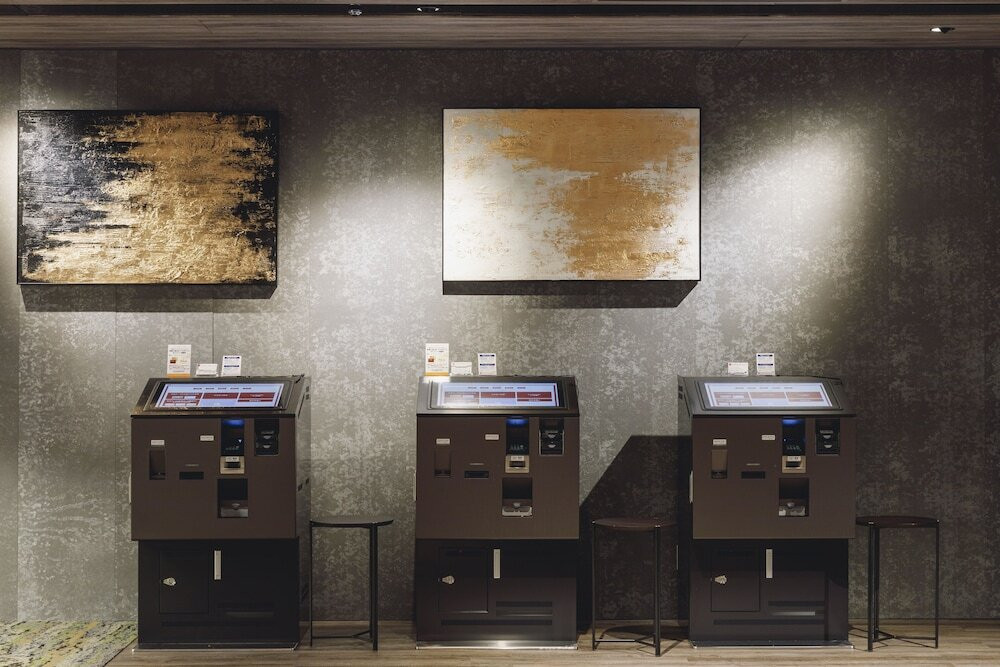 チェックイン / チェックアウト キオスク