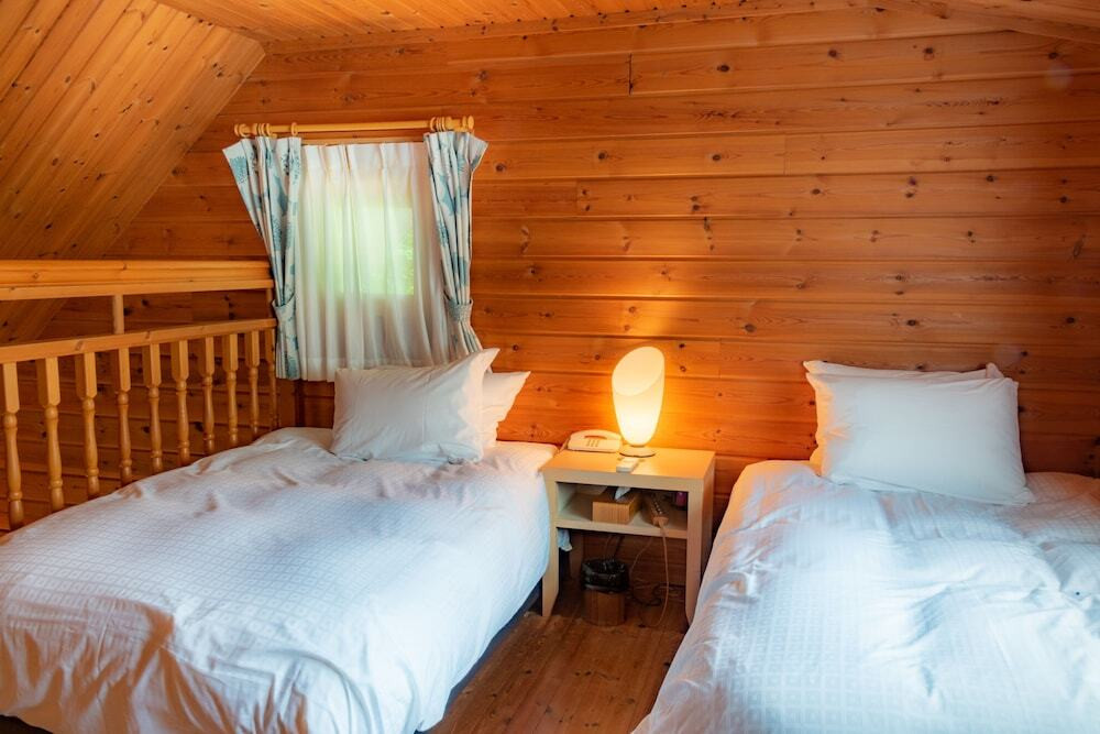 戸建てロッジ フファミリータイプのベッドルーム