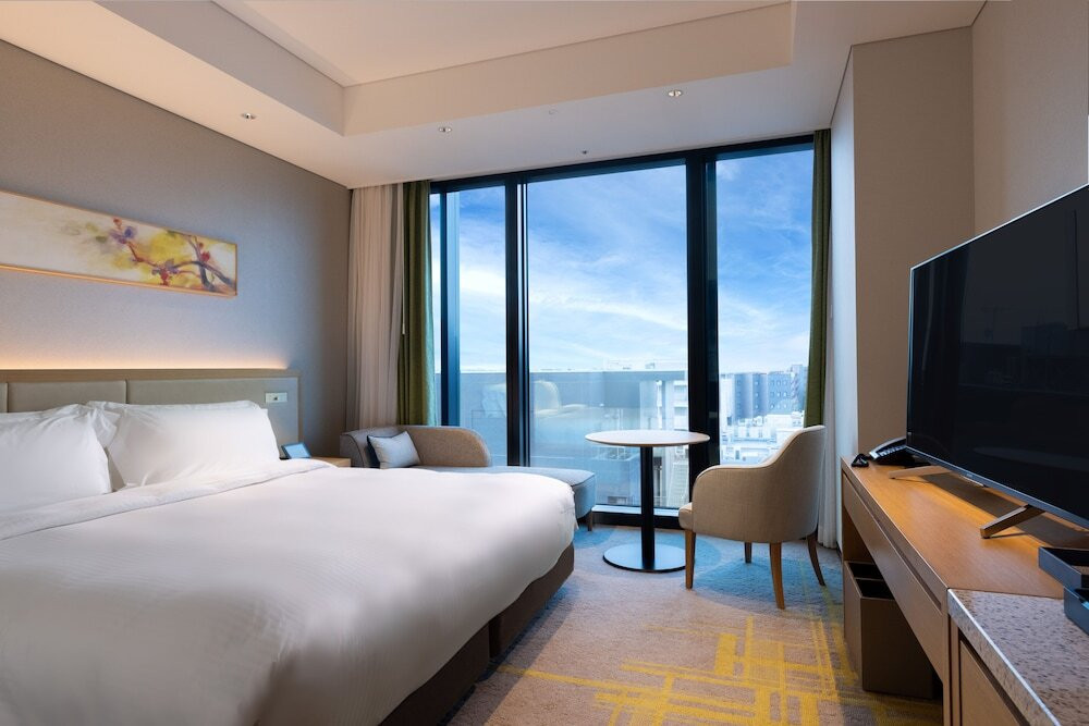 滝の流れ落ちる屋上スパエリアで街を見下ろしながら温泉三昧3465747