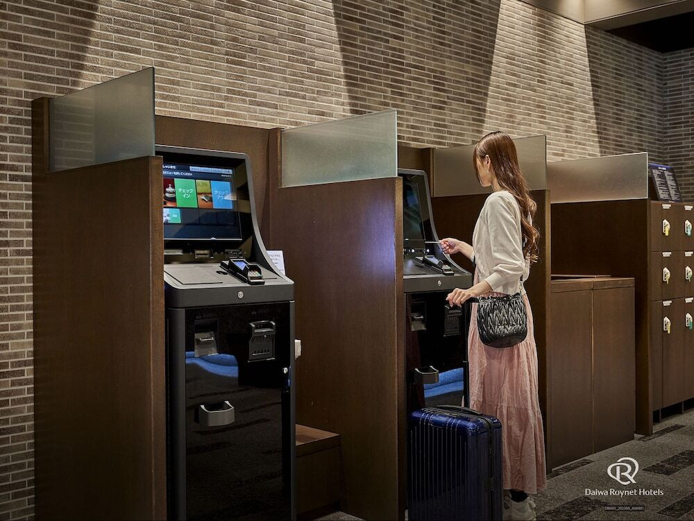 チェックイン / チェックアウト キオスク