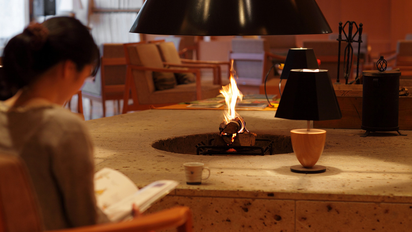 Asian women are yawning after she wake up.