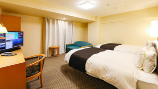 デラックス ツインルーム シングルベッド 2 台 喫煙可