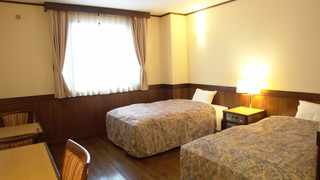 ツインルームシングルサイズベッド 2 台