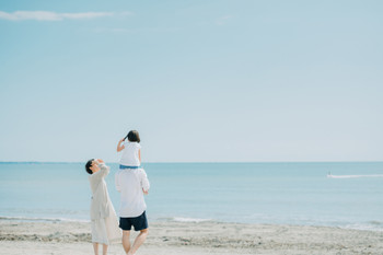 family enjoying sea bathing