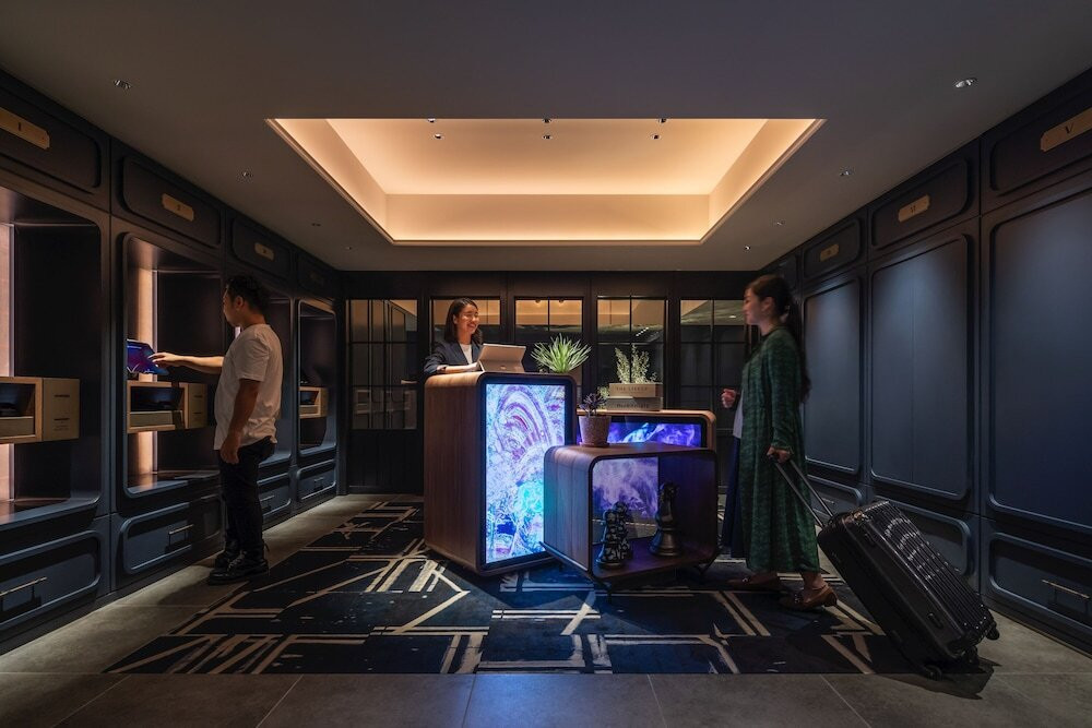 チェックイン / チェックアウト キオスク