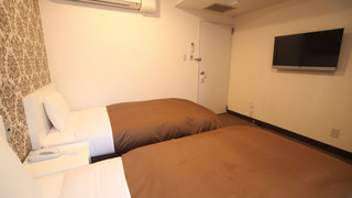 ツインルームシングルサイズベッド 2 台喫煙可