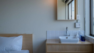 Queen with River View and Shared Bathroom