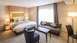 デラックス ダブルルーム クイーンベッド 1 台