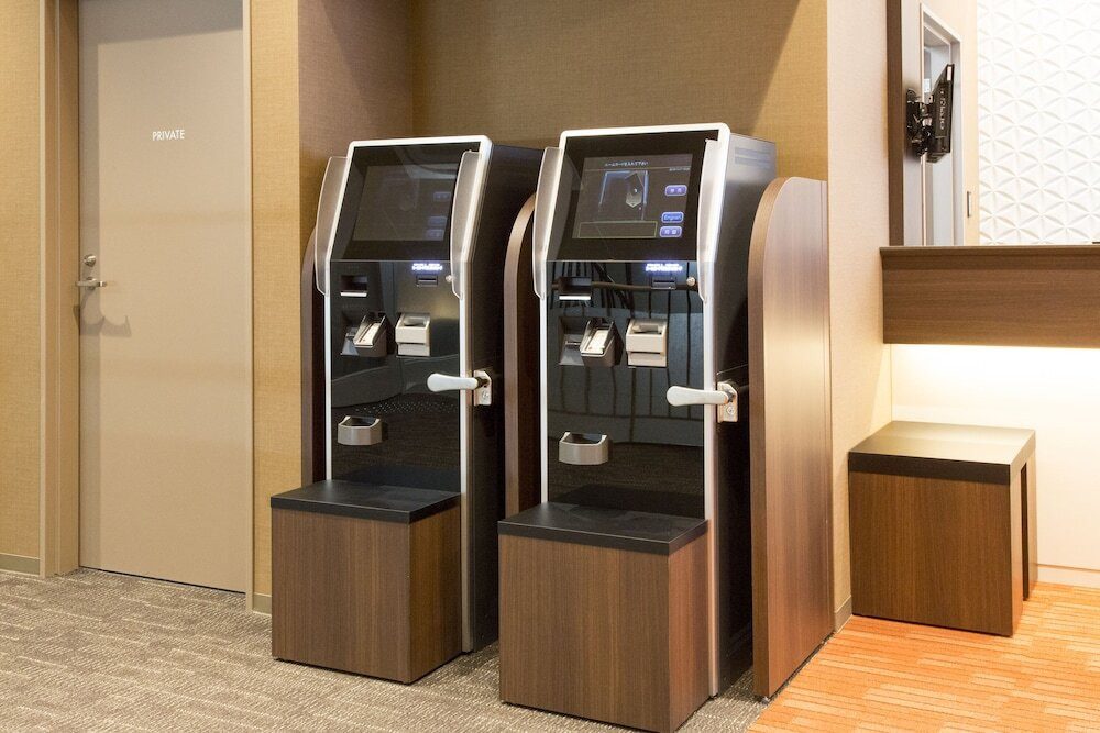 チェックイン / チェックアウト キオスク