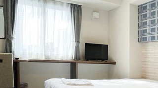 Single room with kitchen and washing machine