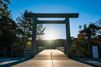Ise Jingu Inner Shrine Sun rising from the Ujibashi torii gate