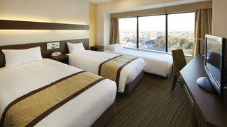 モデレートツインルーム シングルベッド2台 禁煙 9-19階(3人目はソファーベッドを利用)