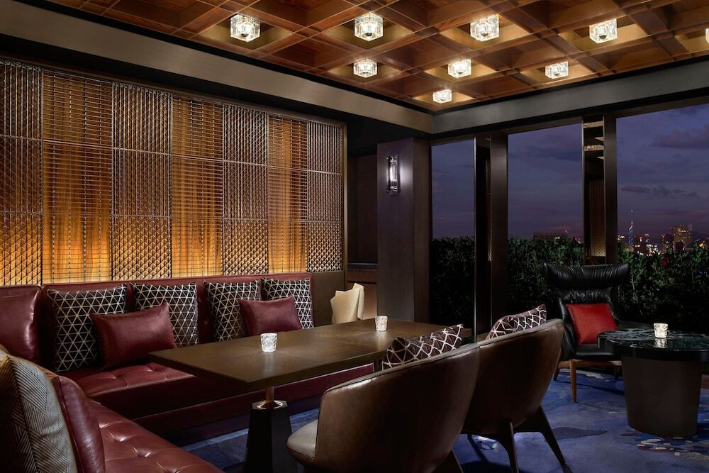 Large luxurious corner sofa with an armchair near