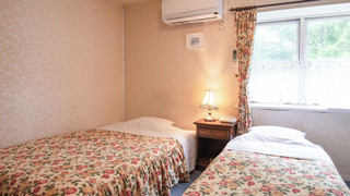 本館2間続き洋室（ツイン／バストイレ・シャワーブース付）