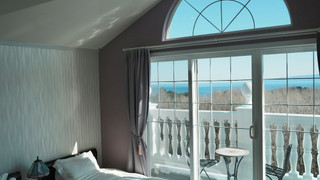 デラックス ツインルーム シングルベッド 2 台 バルコニー パーシャルシービュー