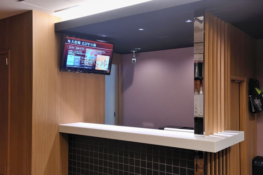 チェックイン / チェックアウト キオスク