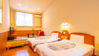 デラックスツイン シングルベッド2台プラス畳エリア (16 sqm)