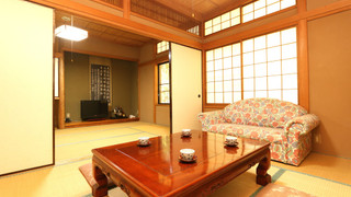 トラディショナル ルーム 4 ベッドルーム 共用バスルーム