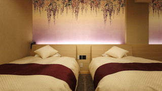 ラグジュアリー ダブルまたはツインルーム 2 ベッドルーム 専用バスルーム パーシャル オーシャン ビュー