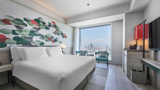 デラックス ルーム キングベッド 1 台 (Yu Standard Floor)