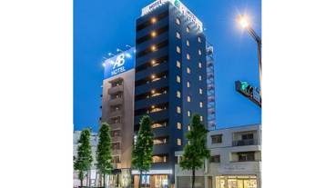 施設の正面 (日没後) / 1