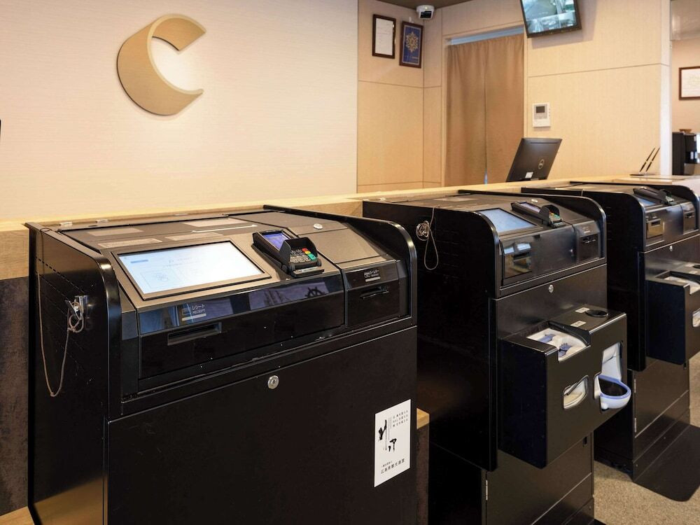 チェックイン / チェックアウト キオスク