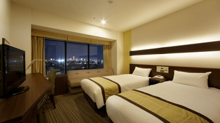 モデレートツインルーム シングルベッド2台 禁煙 9-19階(3人目はソファーベッドを利用)