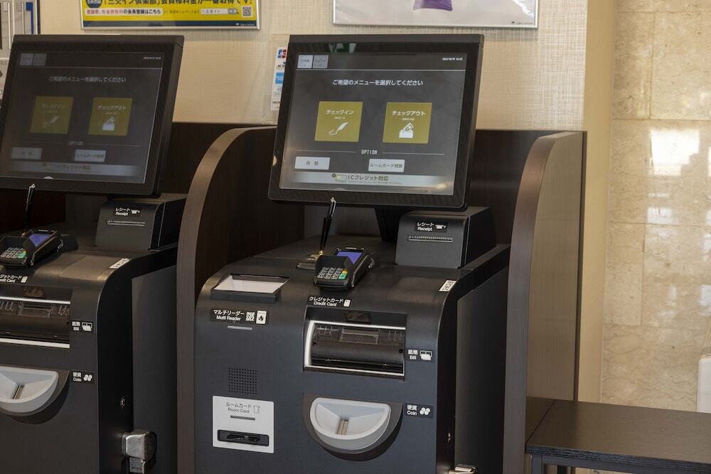 チェックイン / チェックアウト キオスク