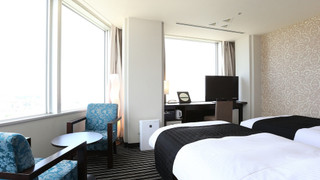 デラックス ツインルーム シングルベッド 2 台 (お子様料金についてはホテルポリシー欄詳細をご覧ください)