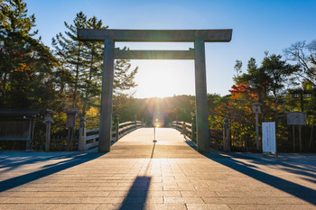 Ise Jingu Inner Shrine Sun rising from the Ujibashi torii gate