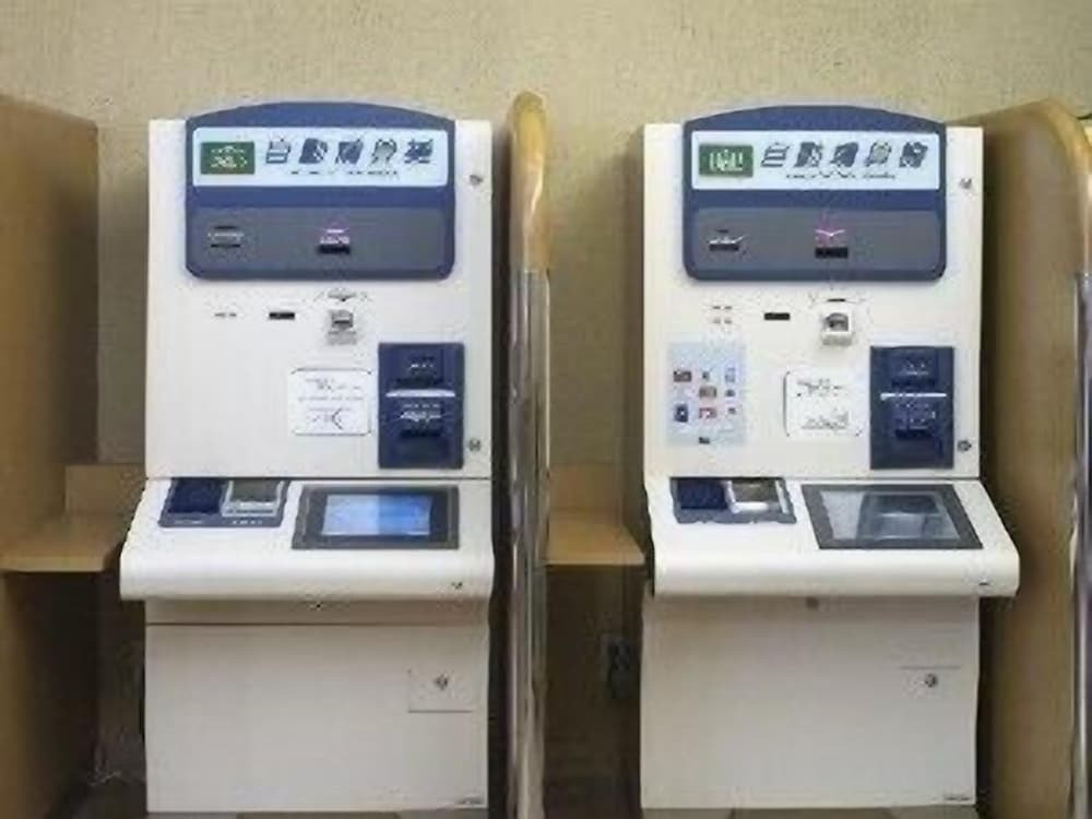 チェックイン / チェックアウト キオスク