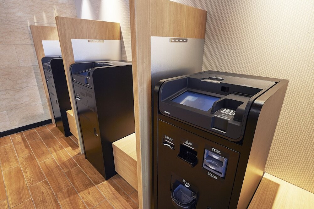 チェックイン / チェックアウト キオスク