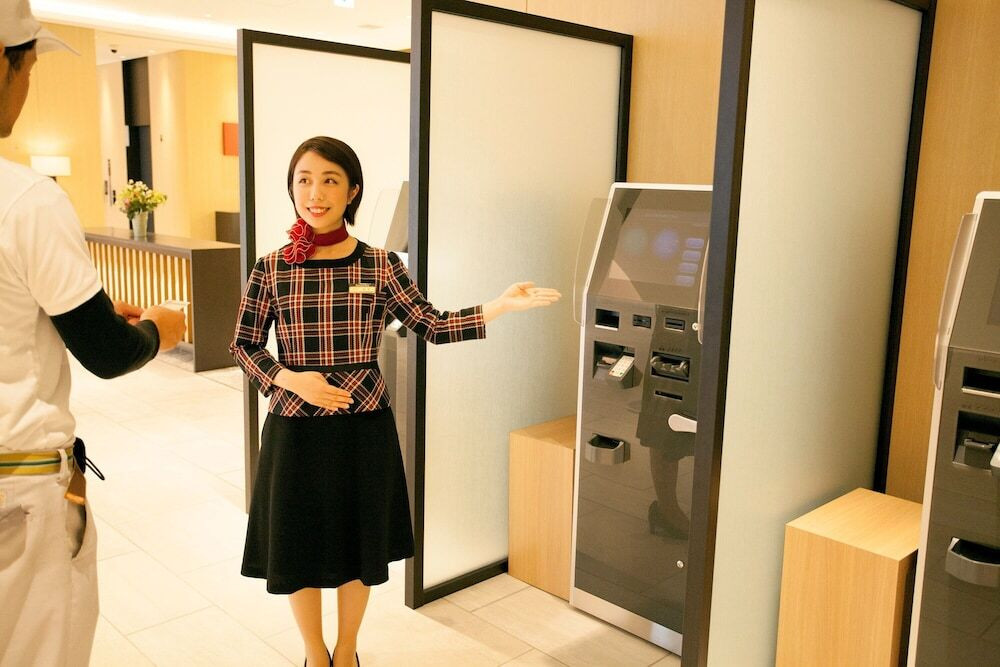 チェックイン / チェックアウト キオスク