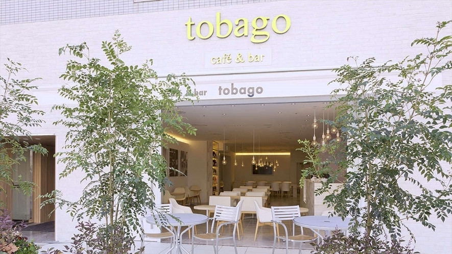 「トバゴ カフェアンドバー」 外観 22835472 緑あふれるテラス席はペットや喫煙もOK