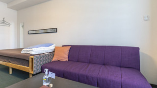 ツインルーム シングルベッド 2 台 共用バスルーム オーシャンビュー