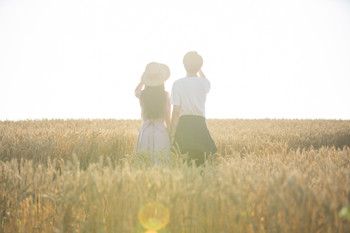 Wheat field and couple