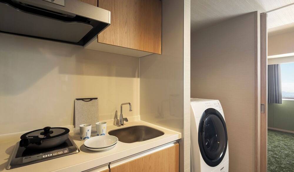 調理器具も揃うキッチン付き客室 / 4