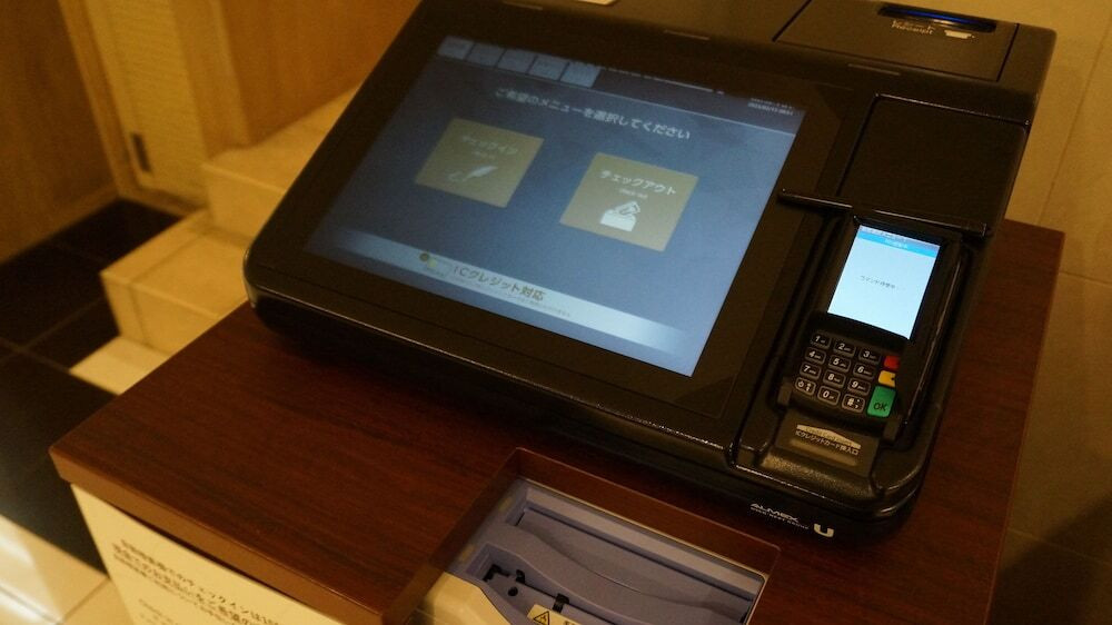 チェックイン / チェックアウト キオスク