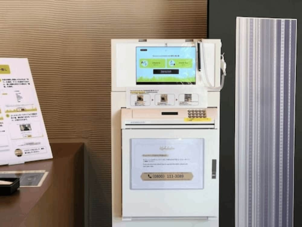 チェックイン / チェックアウト キオスク