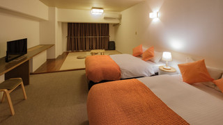 和洋室　デラックスルーム　セミダブルベッド2台＆シングル敷布団２枚　キッチン付　禁煙　清掃料金別　連泊時の清掃なし