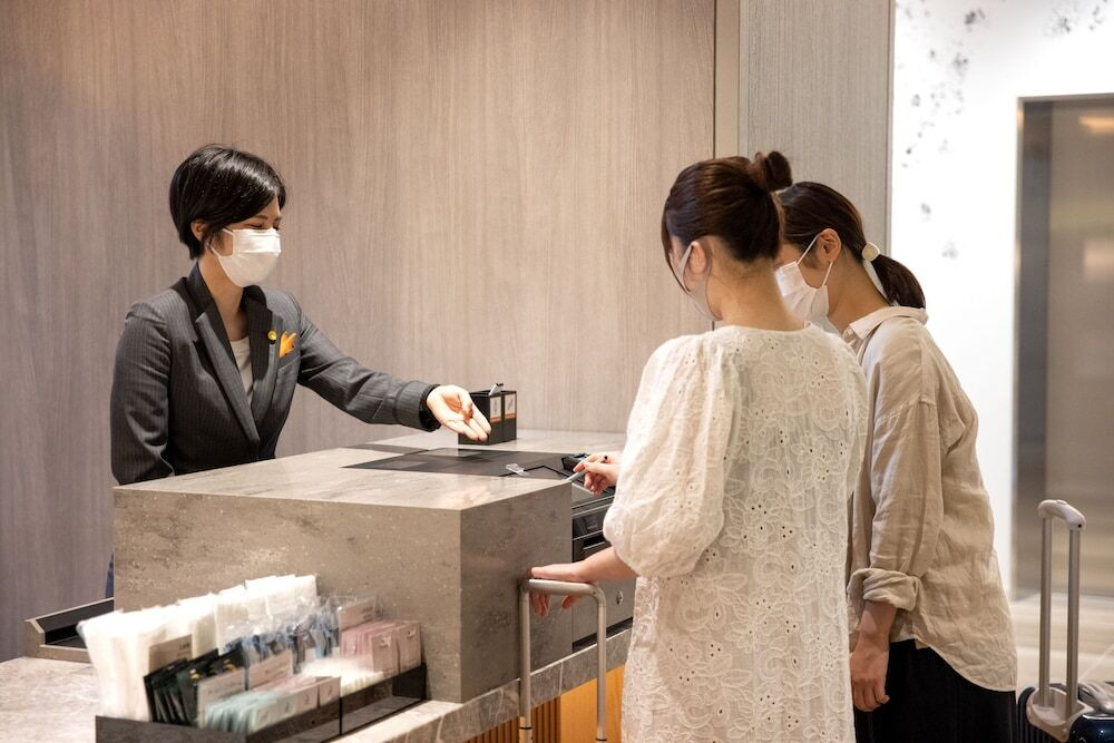 チェックイン / チェックアウト キオスク