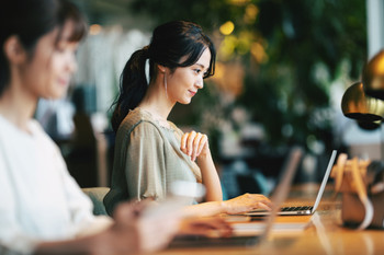 A woman working in a coworking space