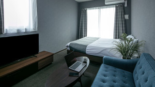 デラックス ダブルルーム クイーンベッド 1 台