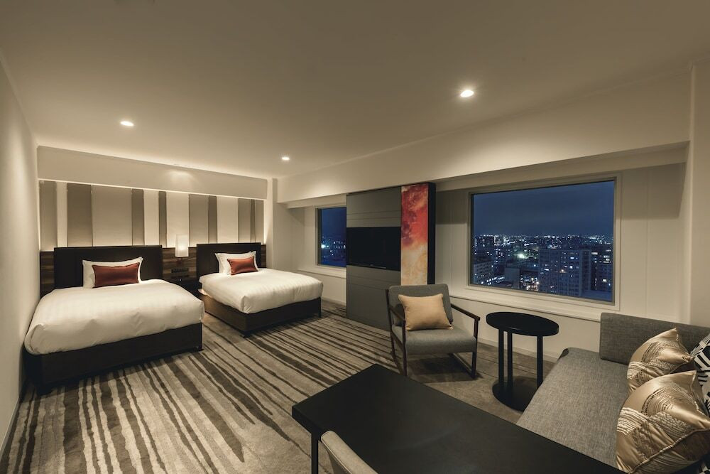 ゆったりとしたお部屋でくつろぎながら見る夜景3394033