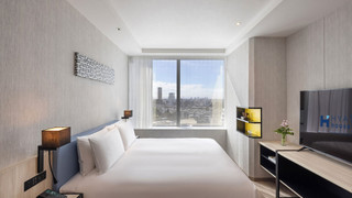 デラックス スイート キングベッド 1 台ソファーベッド付き