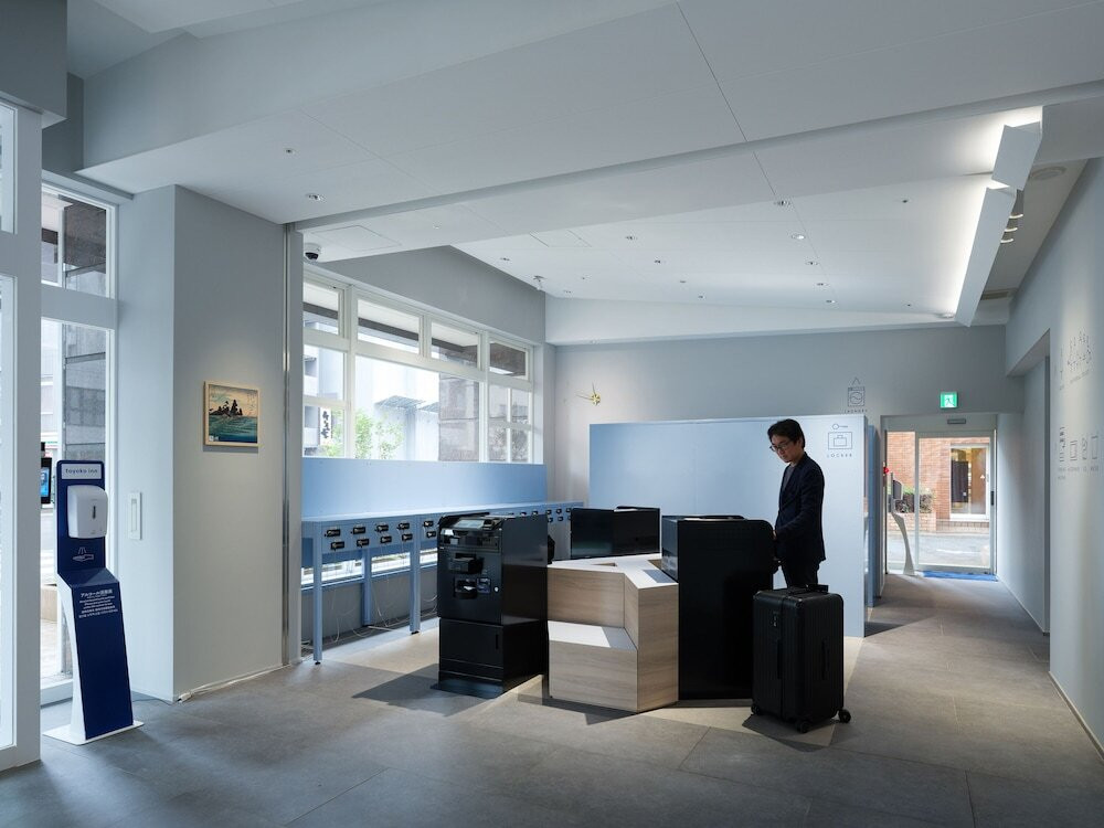 チェックイン / チェックアウト キオスク