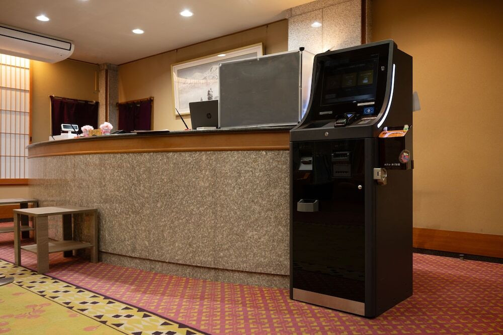 チェックイン / チェックアウト キオスク