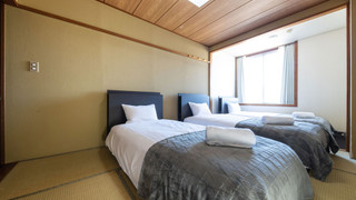 トリプルルーム 共用バスルーム