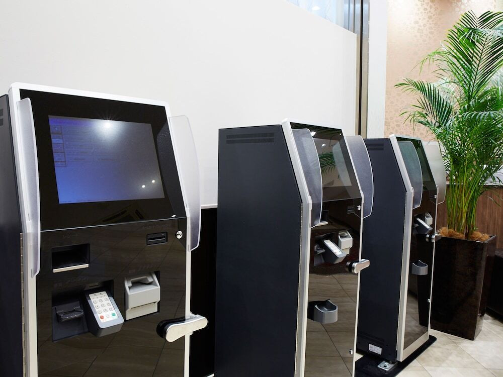 チェックイン / チェックアウト キオスク